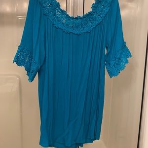Turquoise blue top.